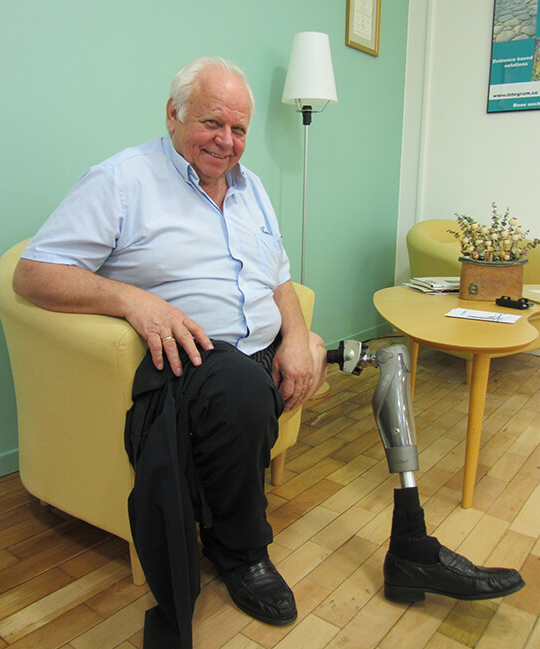 Man with above-knee osseointegrated prosthesis.